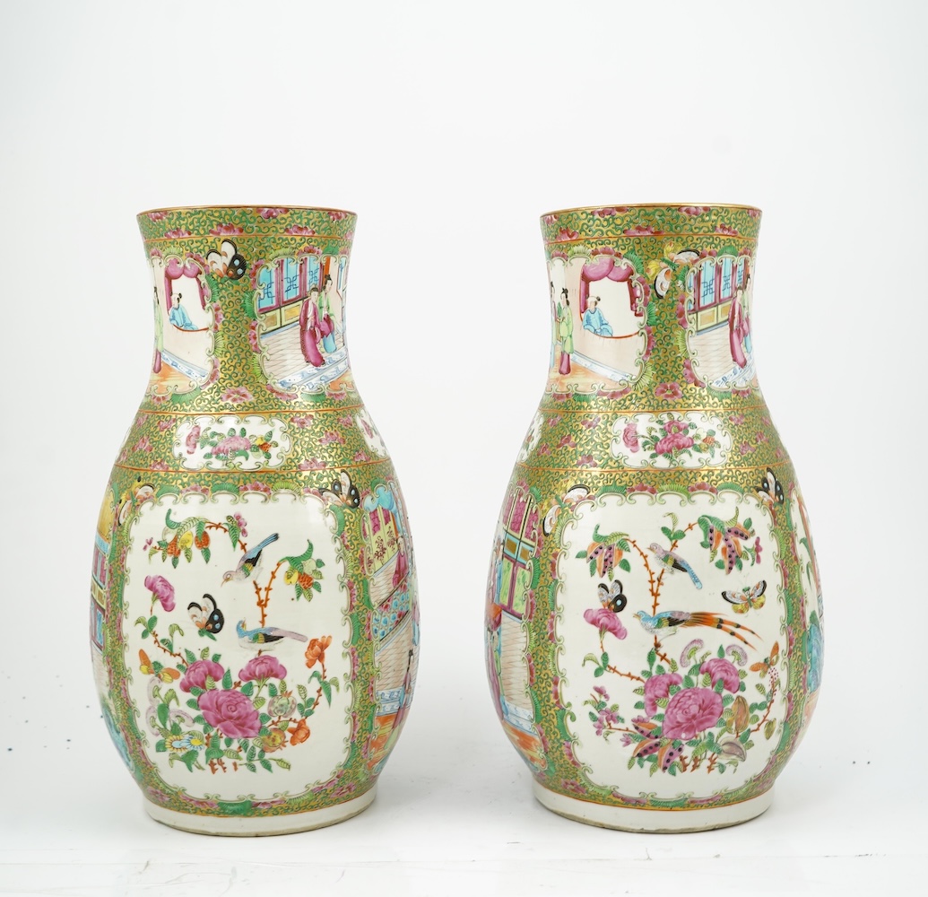 A pair of Chinese famille rose baluster vases, 19th century